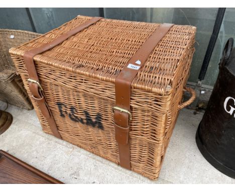 A LARGE WICKER F&amp;M LIDDED BASKET 