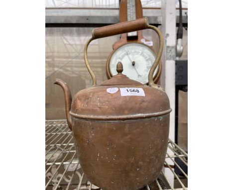 A LARGE VINTAGE COPPER KETTLE 