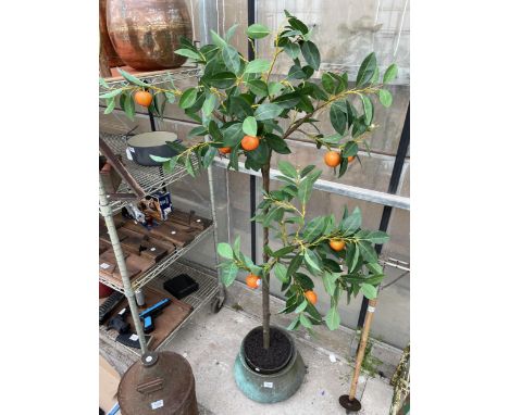 AN ARTIFICIAL ORANGE TREE WITH A DECORATIVE BRASS PLANTER 
