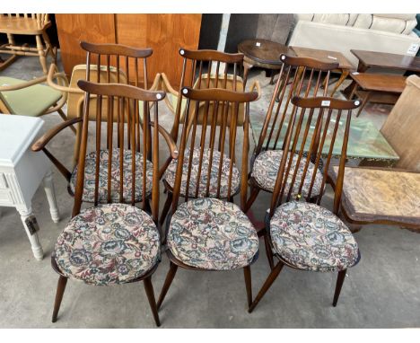 A SET OF SIX ERCOL BLUE LABEL ELM AND BEECH WINDSOR CHAIRS, ONE BEING A CARVER 