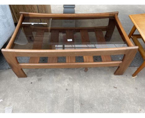 A RETRO TEAK G PLAN STYLE COFFEE TABLE WITH GLASS TOP AND MAGAZINE SHELF 39" X 21" 