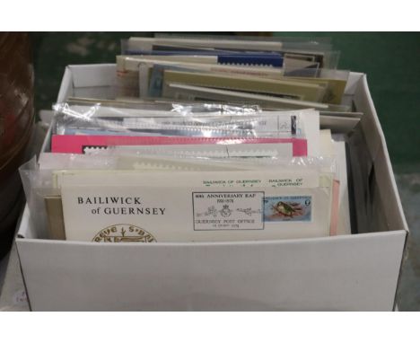 A LARGE QUANTITY OF FIRST DAY COVERS AND POSTCARDS 