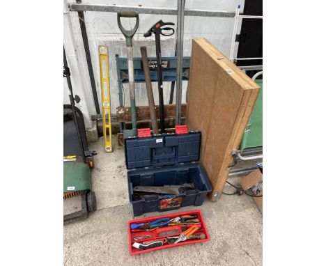 AN ASSORTMENT OF TOOLS TO INCLUDE A SPADE, A WORK MATE BENCH AND A PASTING TABLE ETC 