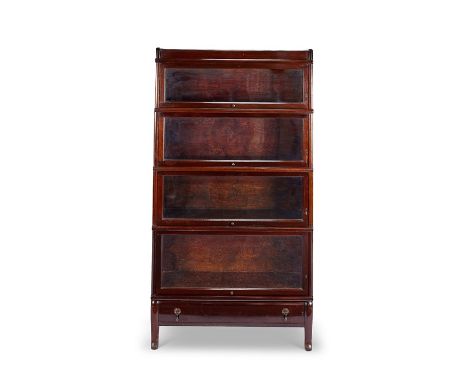 An early 20th century mahogany 'Globe Wernicke' type glazed four-section bookcase
With frieze drawer on outswept feet, with p