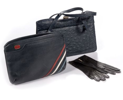 Comprising: a navy blue ostrich skin handbag, a Mino Bossi clutch and a pair of leather Christian Dior gloves, size 6½ the ba