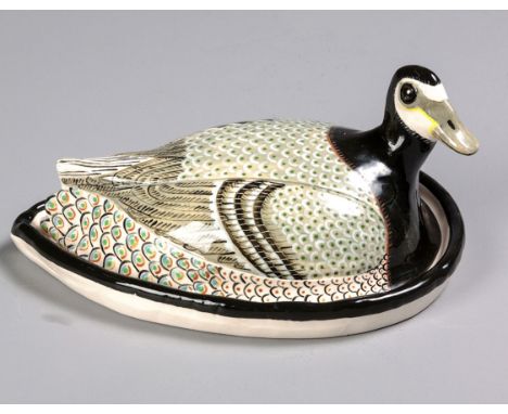 Made and painted by Phineas Mweli, the shaped dish and finely painted cover in the form of a duck, painted PHINEAS MWELI ARDM