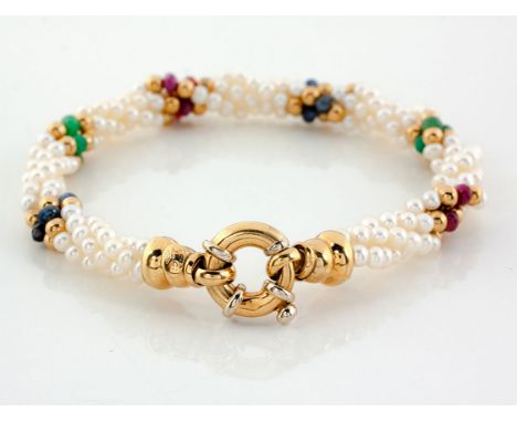 Designed as a four-strand torsade of seed pearls interspersed at regular intervals with gold and gemstone beads, probably rub