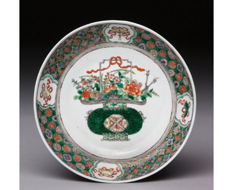 The well painted with a beribboned Wan-pattern basket overflowing with spring flowers and foliage, the rim finely enamelled w