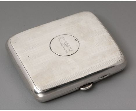 Rectangular, the hinged engine-turned cover engraved C.W.T., the interior inscribed 'To Chris from Mary and Martin Sept 18 19