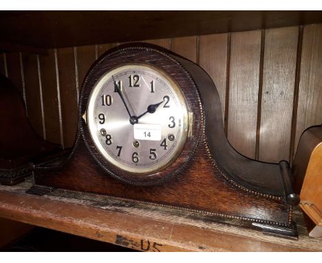 A beaded oak chiming mantle clock, length 42cm. 
