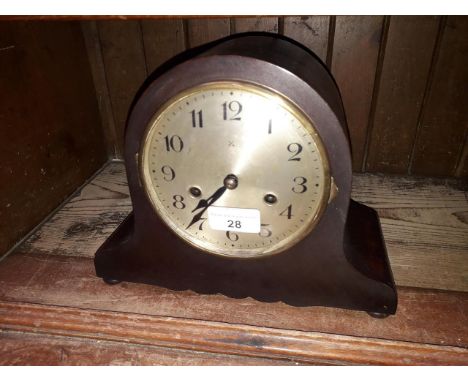 A German domed mantle clock striking on single coil, height 21cm. 