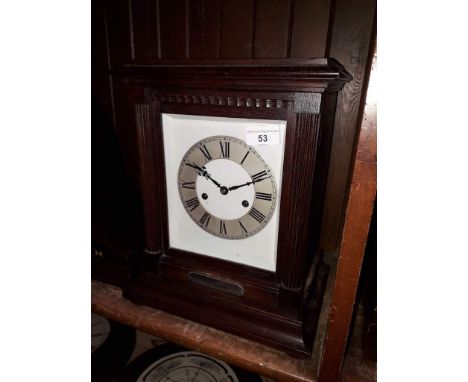 A late Edwardian oak mantle clock with Gustav Becker chiming movement, hallmarked silver presentation plaque to front, height