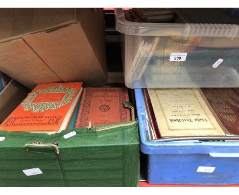 Four boxes of vintage books on violins, musical instruments and music 