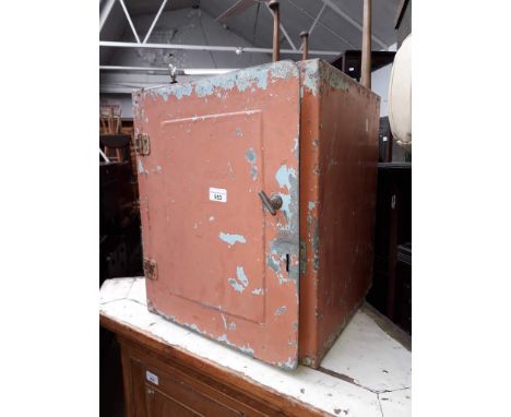 A vintage metal cupboard 