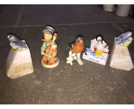 A Hummel boy figure, Goebel chaffinch, two marble bookends 