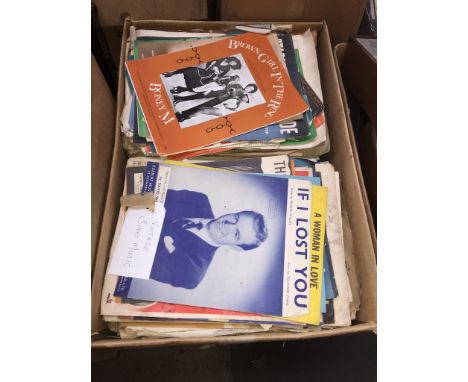 A large box of vintage sheet music 