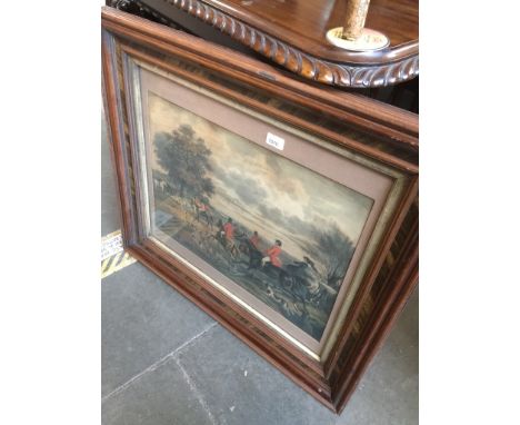 An antique hunting scene coloured print 