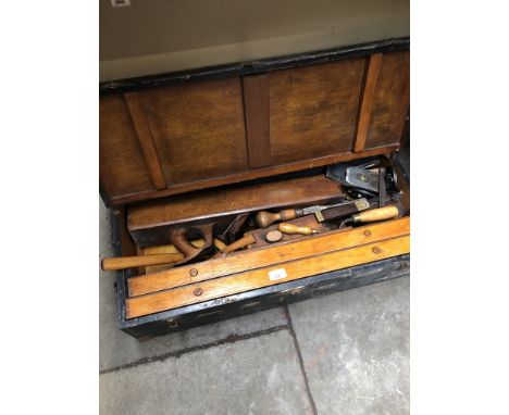 A joiners toolbox with vintage tools including planes, scribe etc