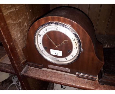 A 1930s domed mantle clock signed Morath Bros Liverpool with hallmarked silver presentation plaque, height 22cm. 