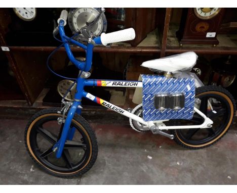 An original 1980s old school Team Raleigh "Mag Burner" BMX, unused with handle bar and cross bar foam, sealed pedals and guar