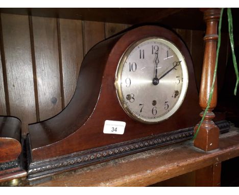 A domed and chiming mantle clock, length 43cm. 