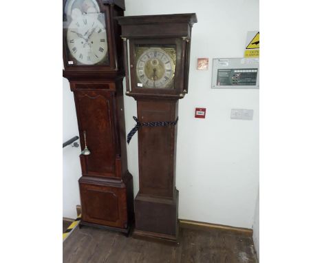 An early 18th century oak 30 hour long case clock, the  11 1/2" brass and silvered dial signed Johannes Jackson, height 188cm