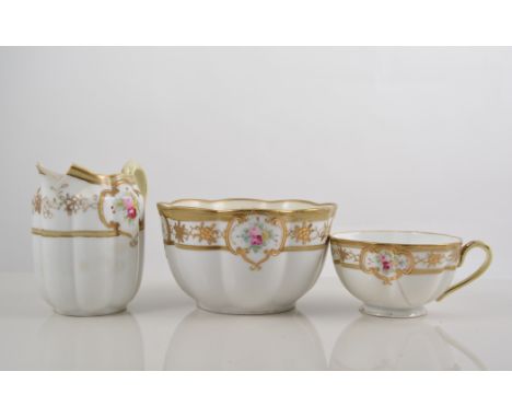 A Noritake floral and gilt tea service.