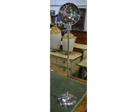 Nickel plated adjustable desk lamp, with three hinges.