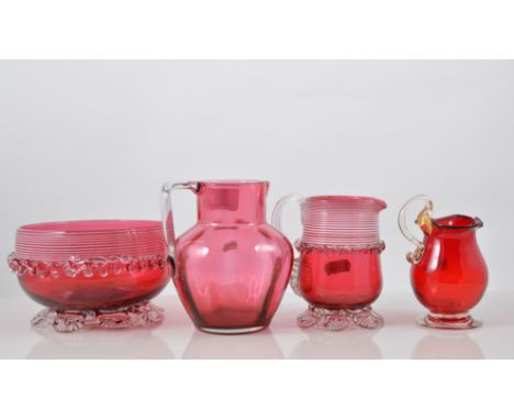 Cranberry glass jug and bowl, applied decoration and trailed banding, bowl diameter 15cms, cranberry glass jug, a Murano Aven