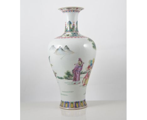 Chinese polychrome baluster shaped vase, decorated with figures in a garden setting, bearing Qianlong seal mark, 38cms.