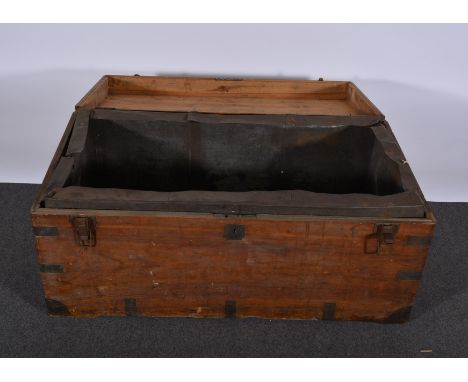 Large teak trunk, plain rectangular form with metal corners, recessed handle and plaque, metal lined, labelled A. H. Foo, Hon