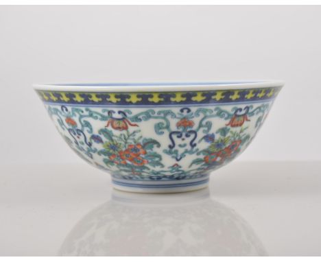 Chinese Doucai bowl, stylised floral decoration, yellow banded border bearing Qianlong six character seal mark, diameter 15.5