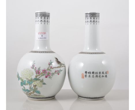 Pair of Chinese bottle vases, decorated in coloured enamels, with flowering foliage and singing birds, bearing printed seal m