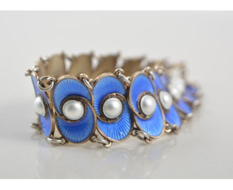 Norwegian silver gilt bracelet, oval blue enamel links with pearlised centre and matching earrings, 20mm wide.