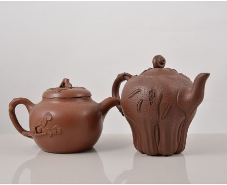 Chinese Red ware leaf moulded teapot, Yixing seal mark, 15cms and four other teapots, (5).