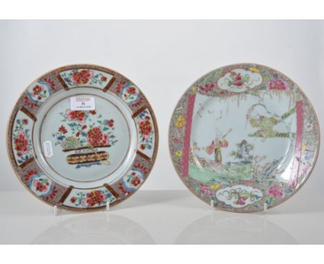 Chinese plate, painted with a floral basket in famille rose enamels, diameter 23cms and another Chinese plate, scroll design 