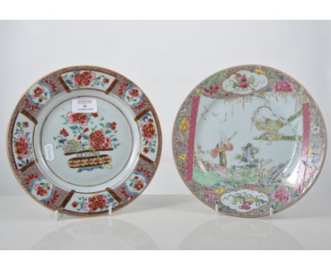 Chinese plate, painted with a floral basket in famille rose enamels, diameter 23cms and another Chinese plate, scroll design 