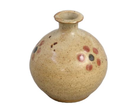 Bernard LEACH (1887-1979)  A bud vase, oatmeal glaze with three formal red and black spot designsHeight 8.5 cmPainted initial