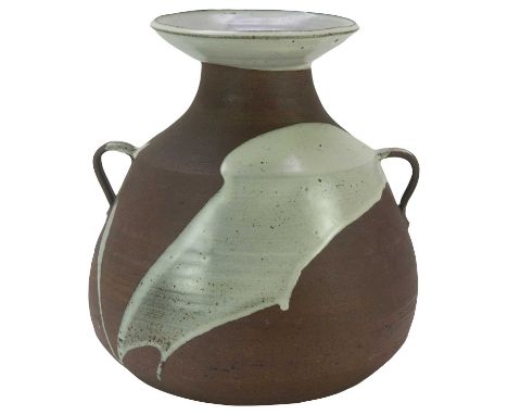 Janet LEACH (1918-1997)  A spectacular twin-handled bellied vase, brown glaze with a bold slash of white across the body on t