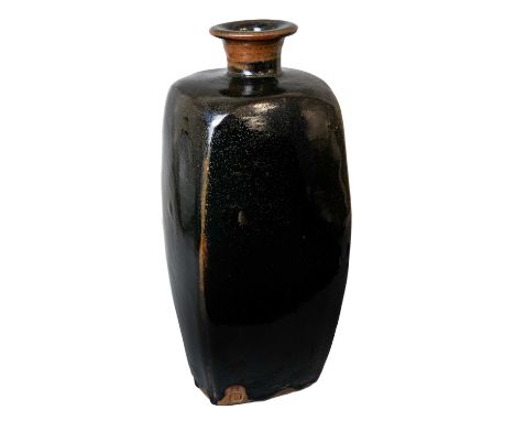 Bernard LEACH (1887-1979)  A large slab-sided vase, circa 1968Uniform black tenmoku glazeHeight 35cmImpressed BL and Leach Po