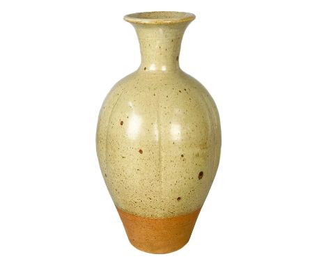 Bernard LEACH (1887-1979)  A large ovoid bottle vase with tall neck and fluted sidesOatmeal glaze with unglazed band to baseH