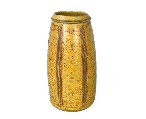 Bernard LEACH (1887-1979)  A vase of stoneware tapered cylindrical formAll over ochre glaze with brown speckles, and alternat