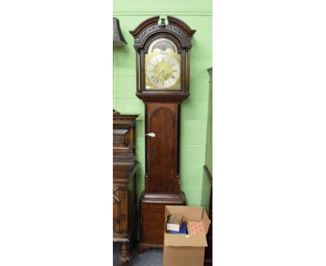 ~ An oak and mahogany thirty hour longcase clock, arch brass dial signed Thos Lawson, Keighley, 18th century