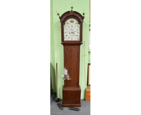 An oak eight day longcase clock, painted arch dial signed Wm Alexander, Aberdeen, circa 1800, in a possible later case 