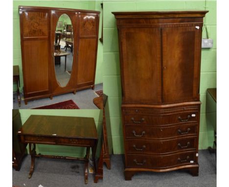 An Edwardian mahogany triple wardrobe, a reproduction Regency style sofa table and a reproduction cabinet (a.f.)