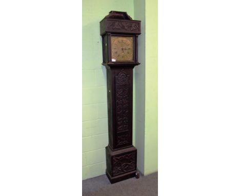 ~ A carved pine cased thirty hour longcase clock, square brass dial with circular disc signed R Marshall, Wolsingham, dial wi