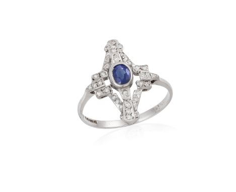 A SAPPHIRE AND DIAMOND RING, centrally set with a collet-set sapphire, to a single-cut diamond surround, mounted in 9K gold, 