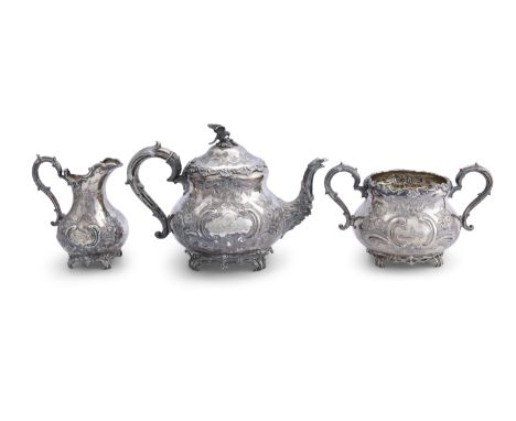 A VICTORIAN SILVER THREE PIECE TEA SERVICE, London 1890, mark of Martin Hall &amp; Co., of circular baluster form, with all-o
