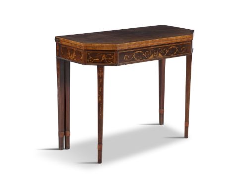 AN IRISH GEORGE IV FOLD-OVER CARD TABLE OF RECTANGULAR FORM, with angled corners, base lined interior, inlaid with foliate sc