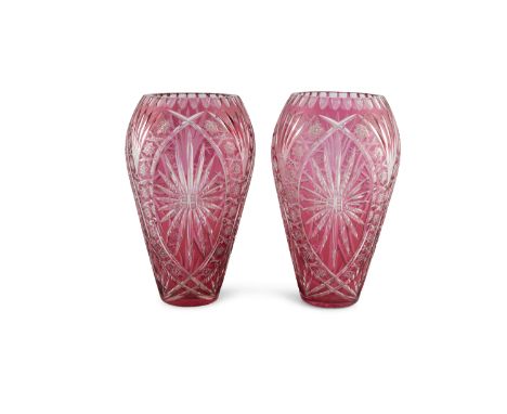 A PAIR OF LARGE BOHEMIAN RUBY AND CLEAR GLASS VASES, c.1930s, of ovoid from, cut with slices and geometric stars, 36cm high